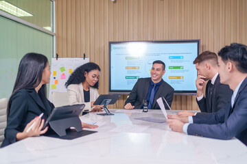 multiracial business team at work together,board meeting to analyze and discuss the situation on the financial report in the office