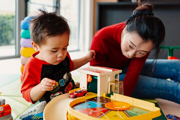 Caring mother with child at education facility