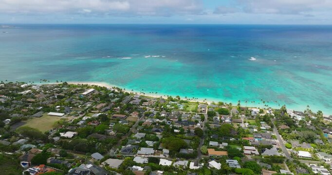 Drone Shot Flying Over Lanikai Pillbox, Lanikai Beach, and Kailua Town in Oahu Hawaii, 4k Aerial Ocean Video