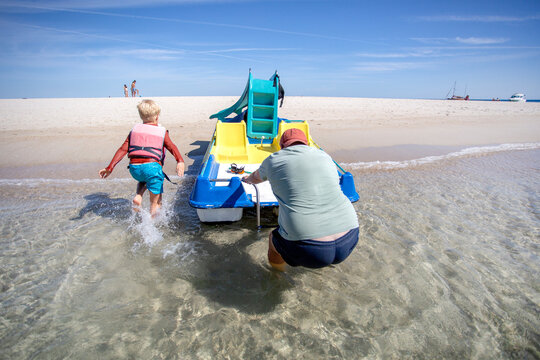 family having fun on catamaran ride