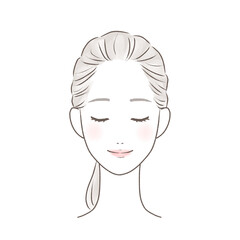 目を閉じたまとめ髪の綺麗な女性