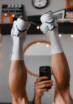 Athletic Feet In Running Shoes And Socks Selfie