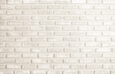 Detail of modern cream brick wall background photo. Brown light brick wall texture background for stone tile block painted in yellow light color wallpaper modern interior and exterior backdrop design.