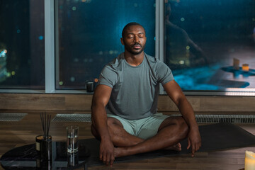 Man Meditating in a Peaceful Indoor Setting