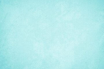 Pastel blue and white concrete stone texture for background in summer wallpaper. Cement and sand wall of tone vintage. Concrete abstract wall of light cyan color, cement texture mint green for design.