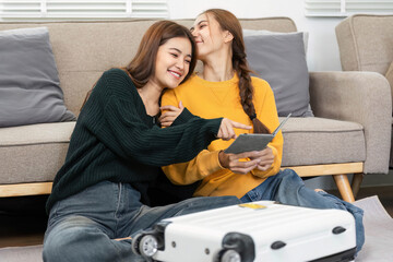 Wellness and togetherness: Women cuddling while reviewing travel details