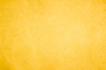 Yellow concrete stone texture for background in summer wallpaper. Cement and sand wall of tone vintage minimal. Concrete abstract wall of light yellow color, cement texture white blank for home decor.