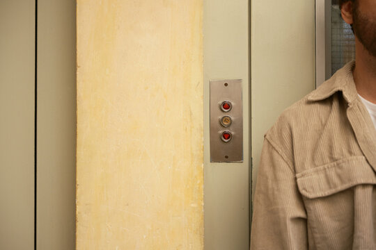 Anonymous waiting for elevator 