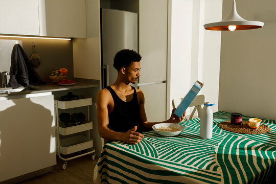 man reading cereal box