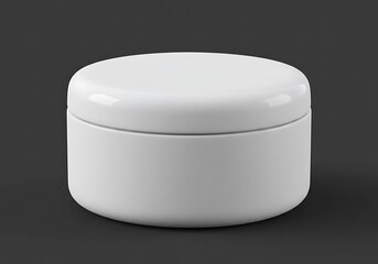 A simple white round container with a lid on a dark gray background in a studio setting shot well