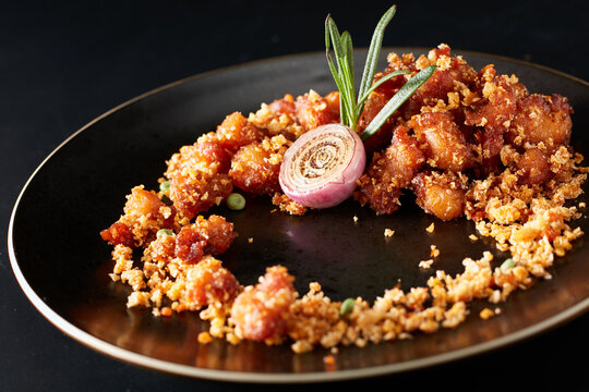 Close-up of fried crispy meat on a plate