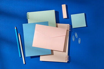 Organized Stationery Flat Lay Featuring Pastel Colors on a Bright