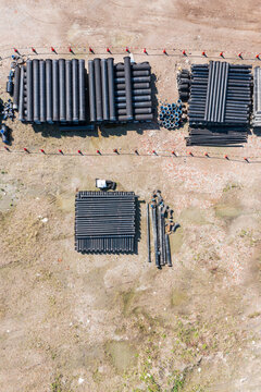Stacked Pipes and Conduits at Construction Site
