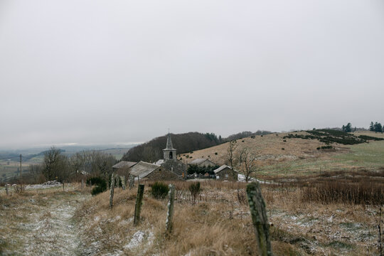 path leading to Village in Auvergne, in French countryside