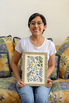 Portrait of a creative woman holding her natural artistic creation