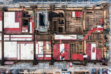 Aerial View of Complex Construction Site with Scaffolding