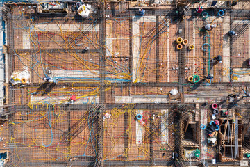 Aerial View of Wiring Construction on a Building's Steel Framework.