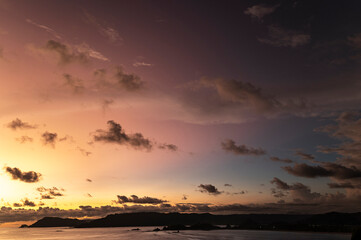 Colorful twilight sky over coastal landscape, Indonesia