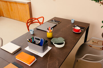 Slightly elevated view of a desk in a shared coworking space