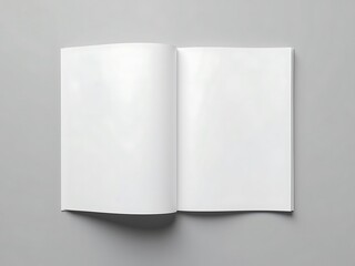 An Open Book With Blank White Pages Lies Flat On A Light Grey Surface, Ready For Writing Or Displaying Content, Publication Mockup