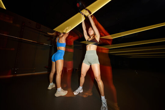 Strength training session with intense focus and movement at gym
