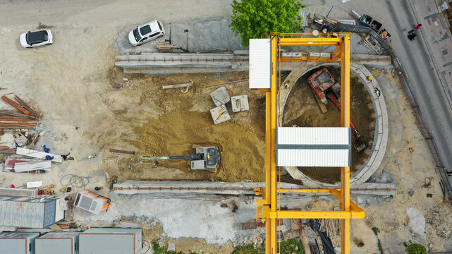 Aerial View of an Urban Construction Site with Heavy Machinery