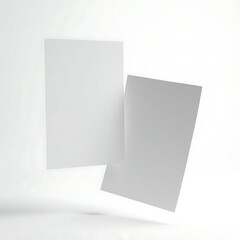 Two A4 flyers mockup floating at different angles in a white studio setup, perfect for showcasing front and back designs