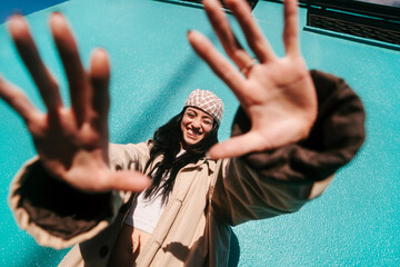 Cool young woman looking at camera portrait