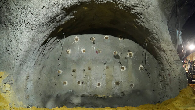 Construction Work Showing Excavation Stages in an Underground Tunnel