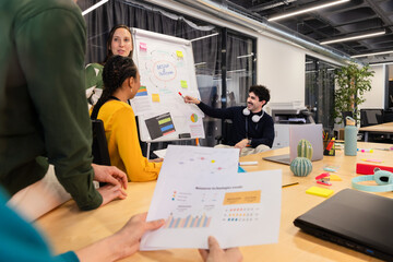 Creative team collaborating on design and prototype planning