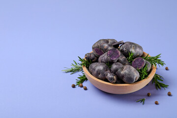 Concept of unusual vegetable - purple potato vegetable