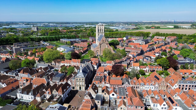 Aerial view of the Saint Catherine church of the medieval fortified village of Brielle at the mouth of the New Maas river near Rotterdam in the province of South Holland, the Netherlands