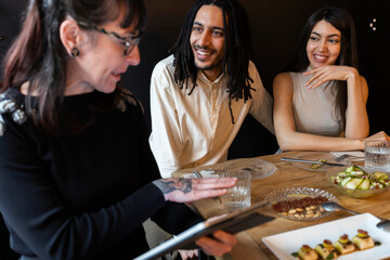 Couple testing dishes deciding wedding menu