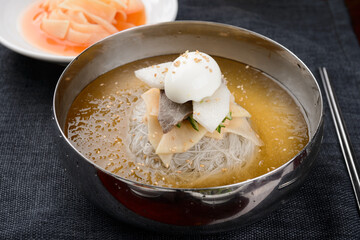 Korean cold noodles with ice cubes
