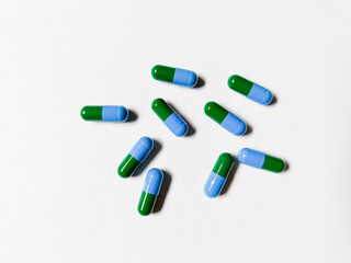 Vitamin D3 or yellow color softgel supplement isolated on a white background.