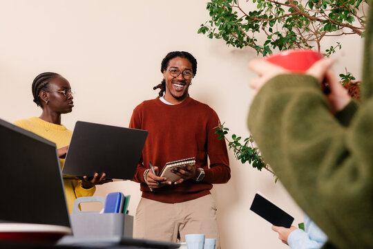 Colleagues working together and exchanging ideas during a meeting