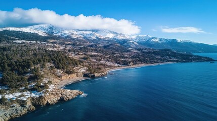 Obraz premium Snowy Mountain Coastline Aerial View: Breathtaking Landscape of Chile