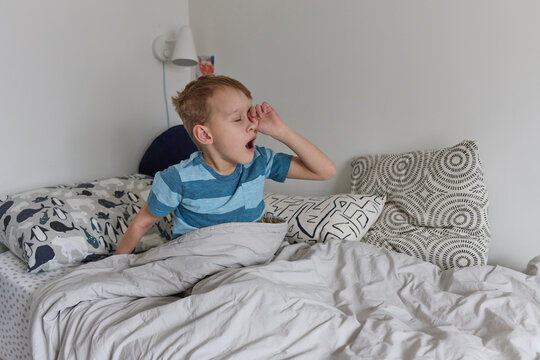 Boy with eczema waking up 