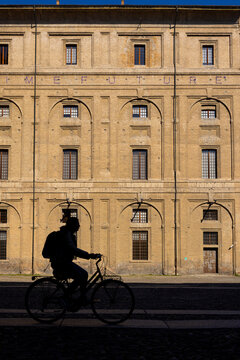 Facade with biker in Parma, Italy