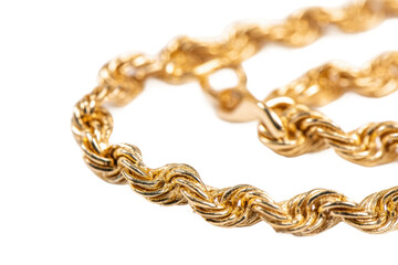 Intricate gold rope chain close-up with detailed texture and shimmering highlights, cut out