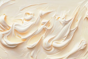 Abstract swirls of thick, pale cream texture, smooth and glossy with flowing patterns in soft white and yellow tones.
