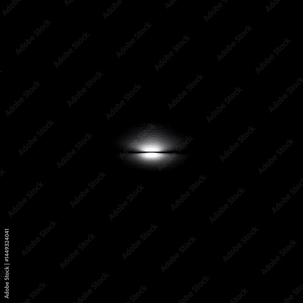 Poster minimalist light: single source illuminating texture in a sea of darkness for dramatic effect.