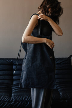 anonymous woman with big shopper bag