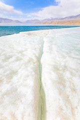 Snow and ice beside Baisha Lake in the Pamir Plateau, Xinjiang, China