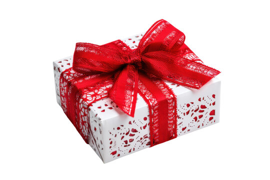 White gift box with red lace ribbon bow on black background, cut out - Powered by Adobe
