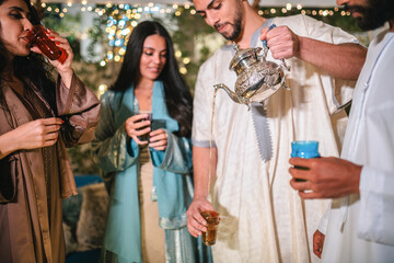 Close Friends having Moroccan tea during Iftar