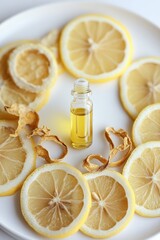 Lemon slices and essential oil create a fresh and vibrant arrangement on a plate