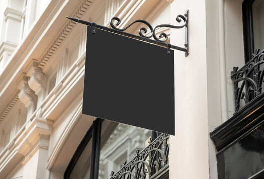 Modern outdoor shop sign with copy space to add company logo