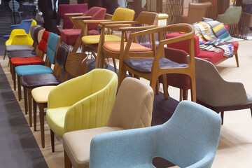 Modern chairs on the window of a furniture store