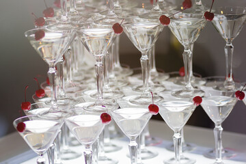 Cocktail glasses arrangement in a form of pyramid.